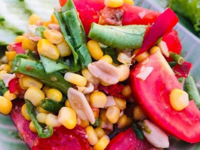 spicy salad with tomatoes and peanuts